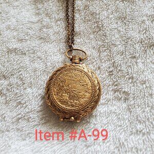 A vintage perfume gold pendant with cluster diamond above pendant, item #A-99